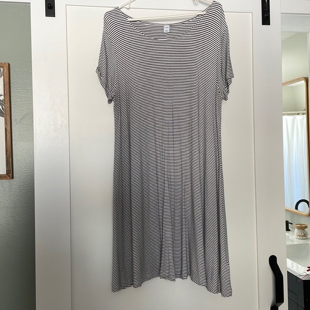 Women’s black and white strip dress.